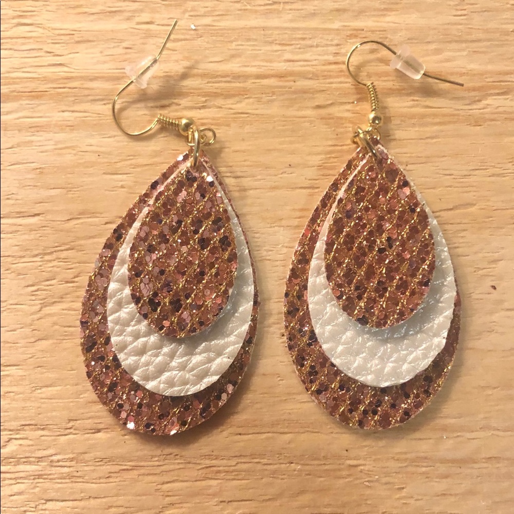 Handmade layered leather earrings.